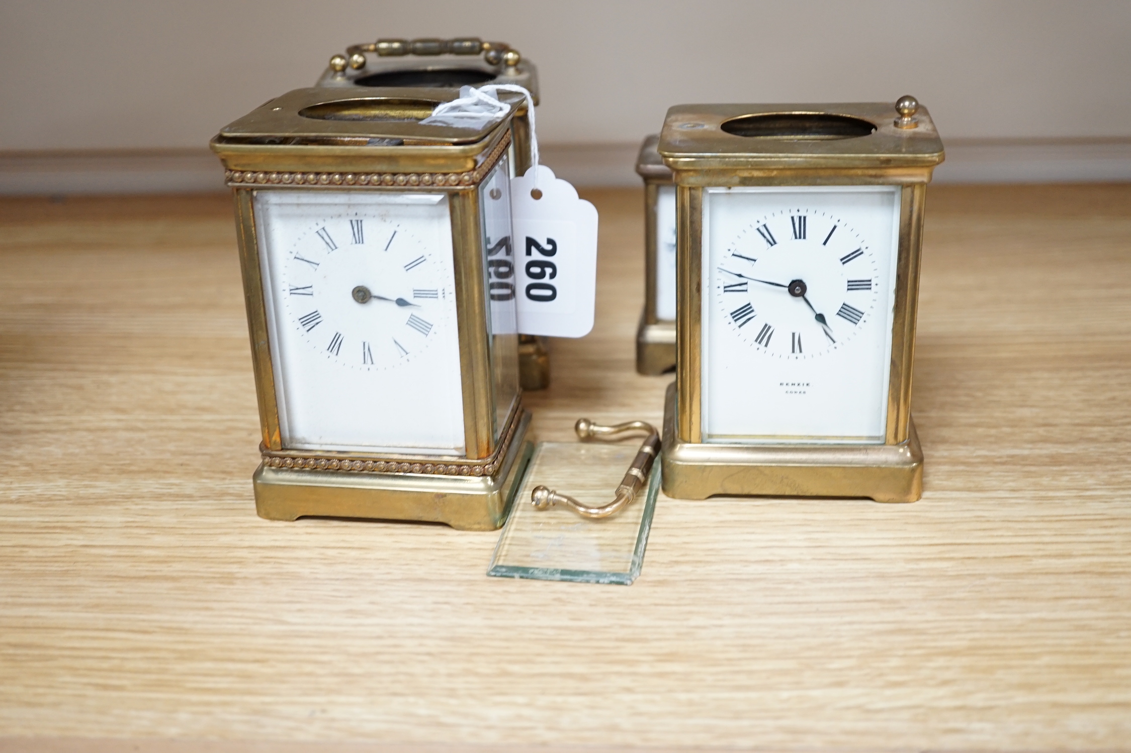 Four carriage clocks in varying sizes, tallest 12cm high